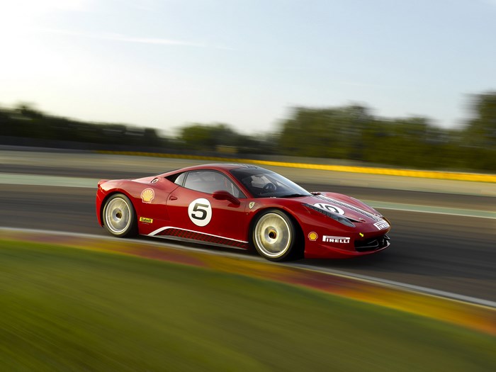 Red Ferrari 458 Challenge race car on track