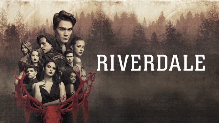 Riverdale characters in front of a forest