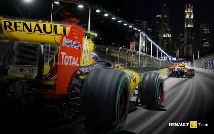 Renault R30 Formula 1 cars racing at night