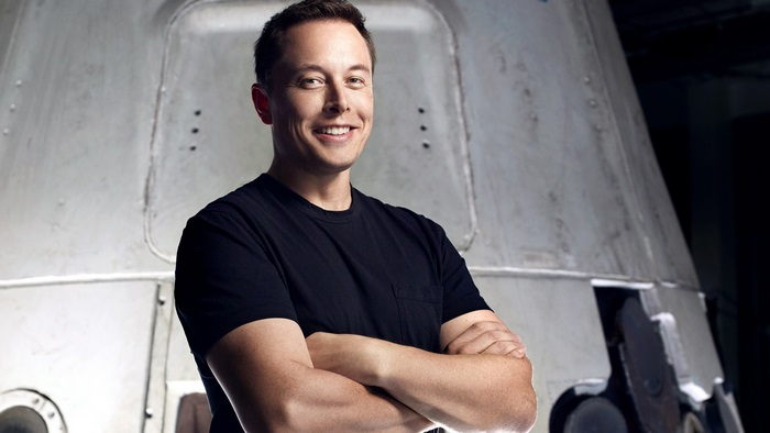 Elon Musk in front of a rocket