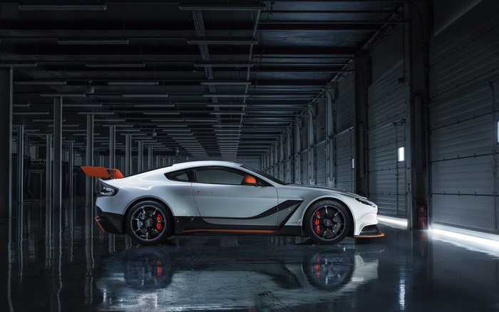 White Aston Martin Vantage GT12 with orange accents