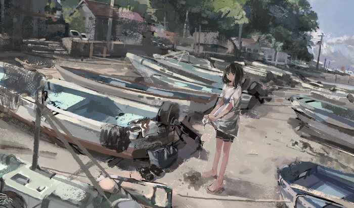 Girl on a beach with boats