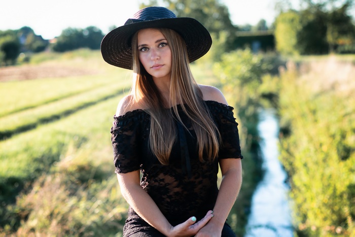 Woman in Black Dress and Hat 4K