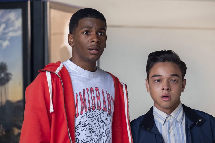 Brett Gray in a red hoodie and t-shirt
