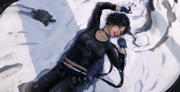 Girl with turtle lying on snow