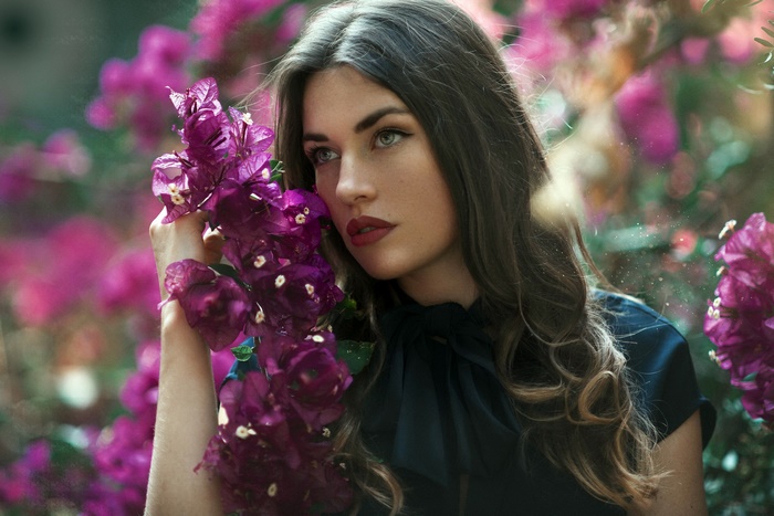 Woman with Brunette Hair and Purple Flowers
