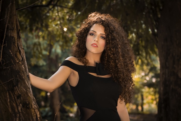 Brunette Woman with Long Curly Hair