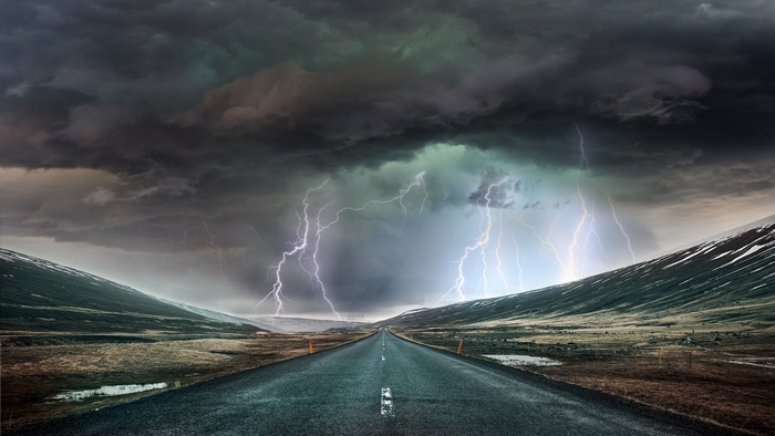 Stormy Road with Lightning Strikes