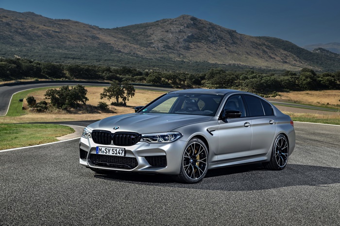 Silver BMW M5 Competition on a Race Track