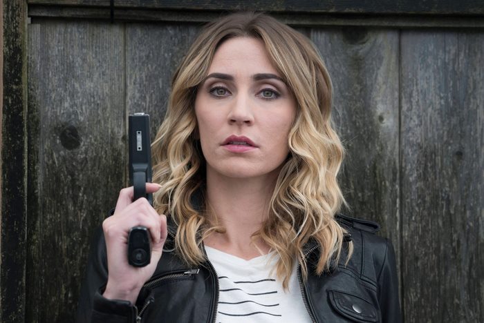Jessica Harmon holding a gun