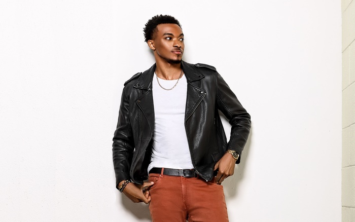 Jonathan McReynolds in a black leather jacket