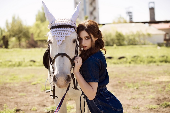 Woman with a white horse