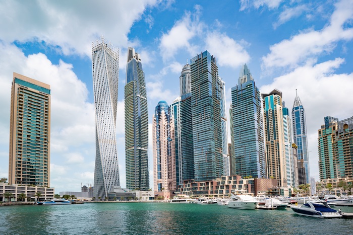Dubai Marina skyscrapers and yachts in United Arab Emirates 4K