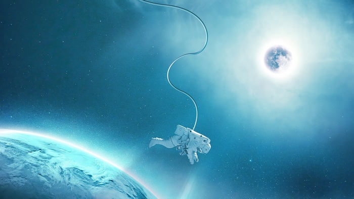 Astronaut tethered to Earth with Moon in background