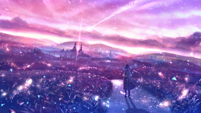 Girl walking through a field at sunset