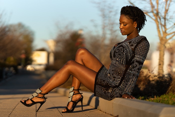 Woman with black hair and high heels