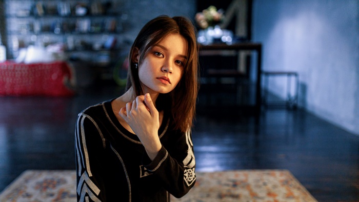 Woman with brunette hair indoors