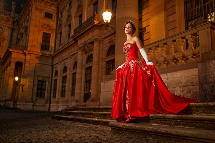 Woman in a red dress on stairs