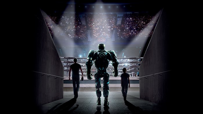 Atom and trainers enter boxing ring from Real Steel
