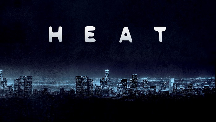 Heat movie title over city skyline
