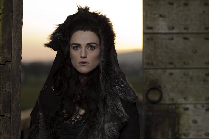 Morgana from Merlin wearing a fur-lined hood