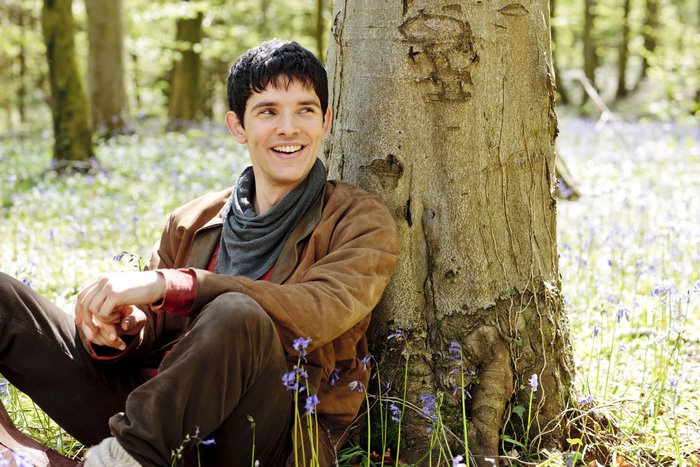 Colin Morgan as Merlin in a forest