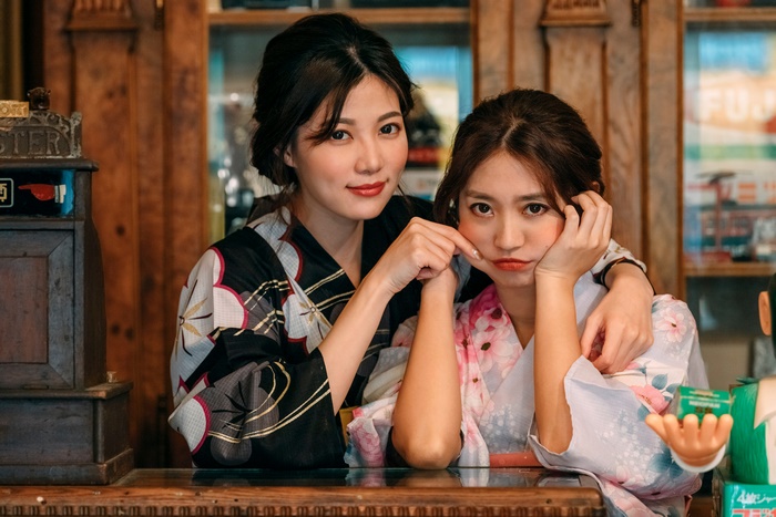 Two Asian women in kimonos