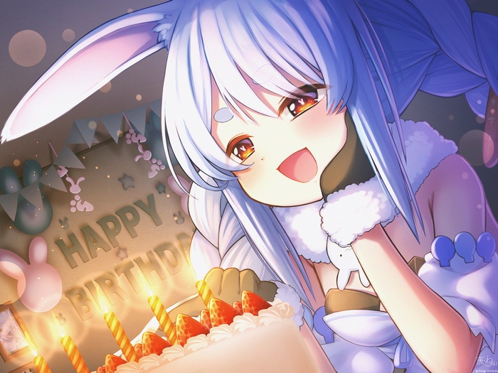 Usada Pekora from Hololive celebrating her birthday with a cake
