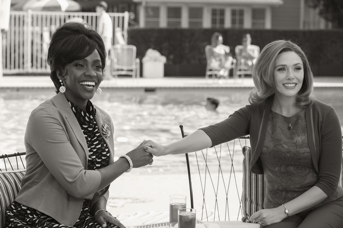 Monica Rambeau and Wanda Maximoff by the pool