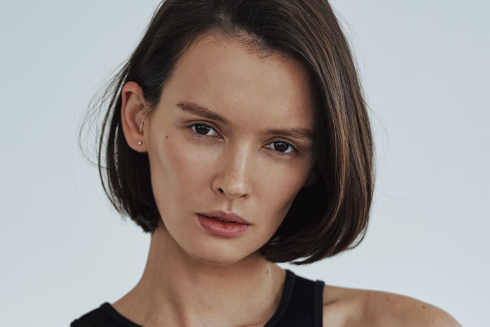 Paulina Andreeva with short brown hair and brown eyes