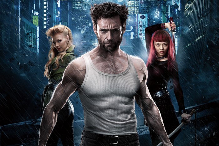 Wolverine and two women in a city