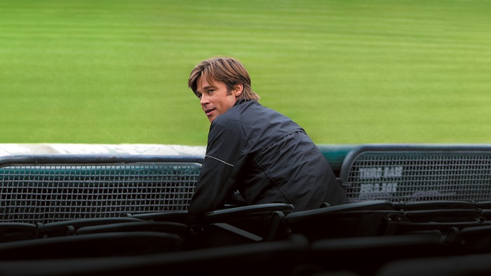 Brad Pitt sitting in stadium seats