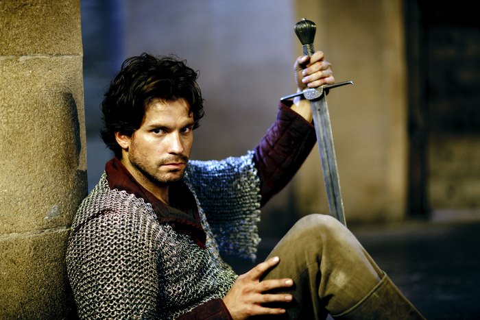Lancelot from Merlin holding a sword