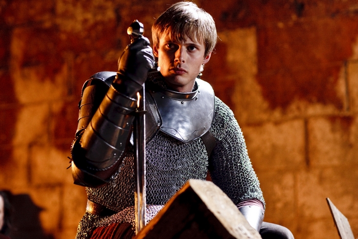 Arthur from Merlin holding a sword