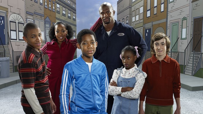 Everybody Hates Chris cast in front of buildings