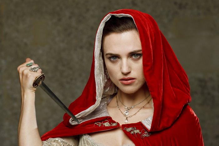 Morgana from Merlin holding a dagger
