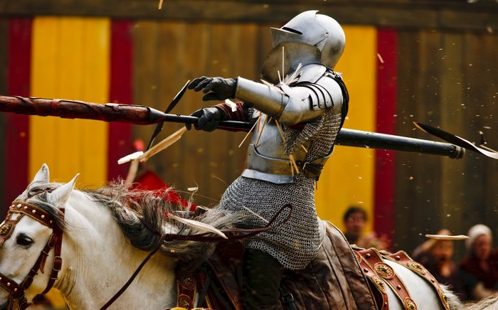 Knight in Armor Jousting on Horseback