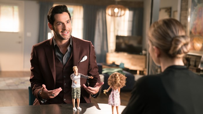 Lucifer Morningstar and Chloe Decker with dolls