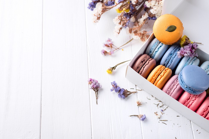 Macarons in a box with dried flowers