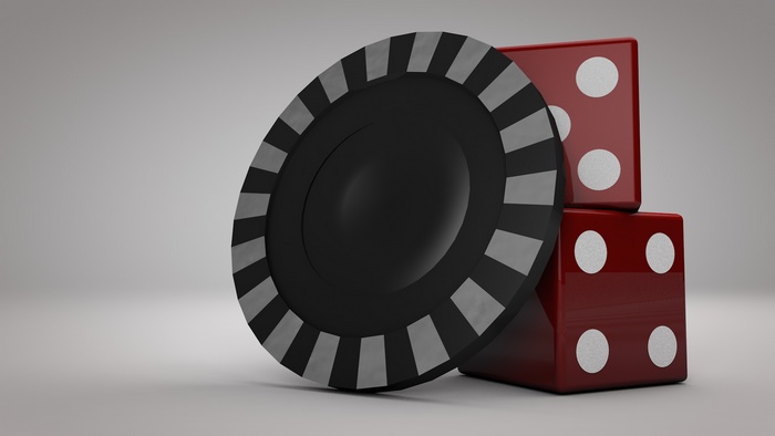 Casino chip and red dice