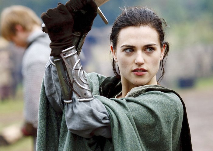 Morgana from Merlin holding a sword
