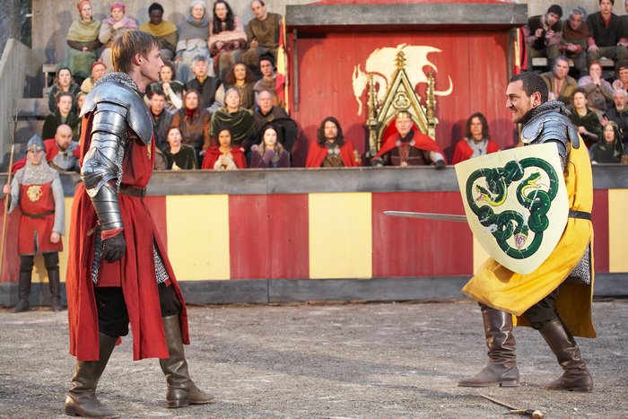 Arthur and Valiant from Merlin in a jousting arena