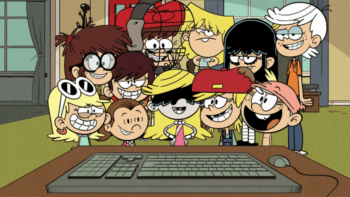 The Loud House characters gathered around a computer
