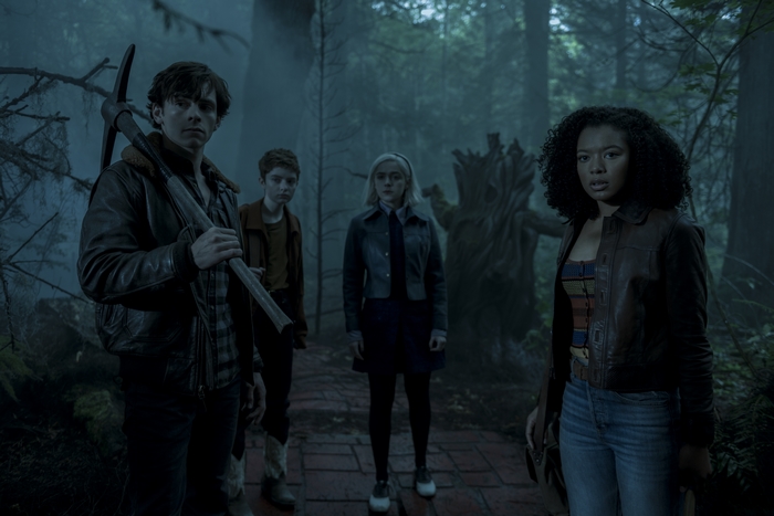 Sabrina Spellman and friends in a forest