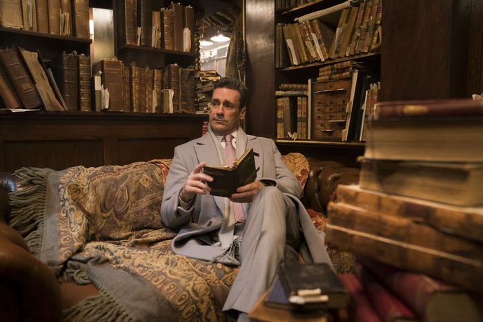 Gabriel from Good Omens reading a book