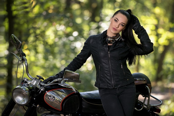 Woman in Leather Jacket with Pannonia Motorcycle
