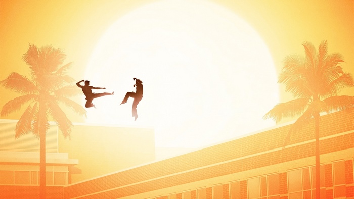 Two martial artists fighting in front of a large sun and palm trees