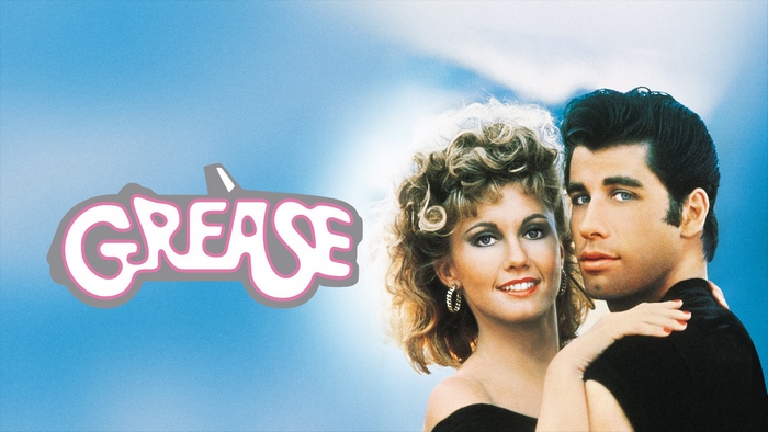 Grease movie poster with John Travolta and Olivia Newton-John