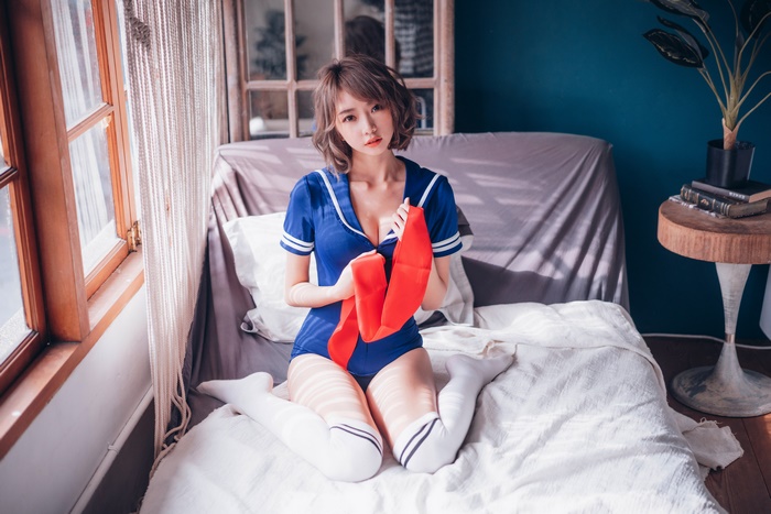 Asian Woman in Blue Sailor Outfit 4K