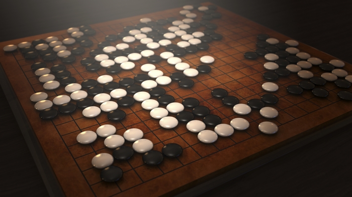 Go board game with black and white stones